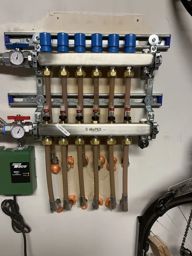 Plumber performing Gas Line Installation at a residential property in Aurelius